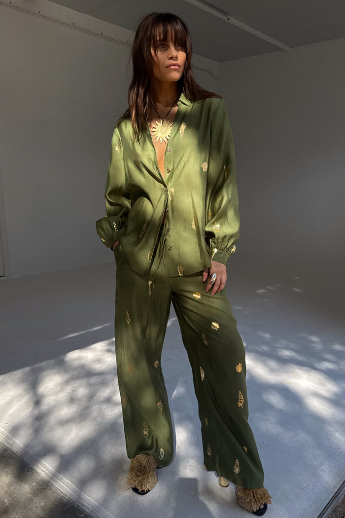 Khaki Shell Trousers with a gold shell print, featuring a wide-leg fit and matching shirt as a chic co-ord set.