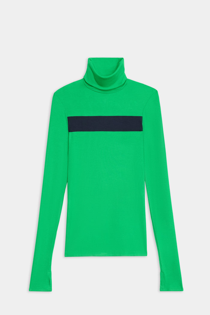 The SPLITS59 Lennon Rib Turtleneck in Grass/Indigo features bright green ribbing and a navy chest stripe—ideal for yoga or running, shown laid flat on a white background.