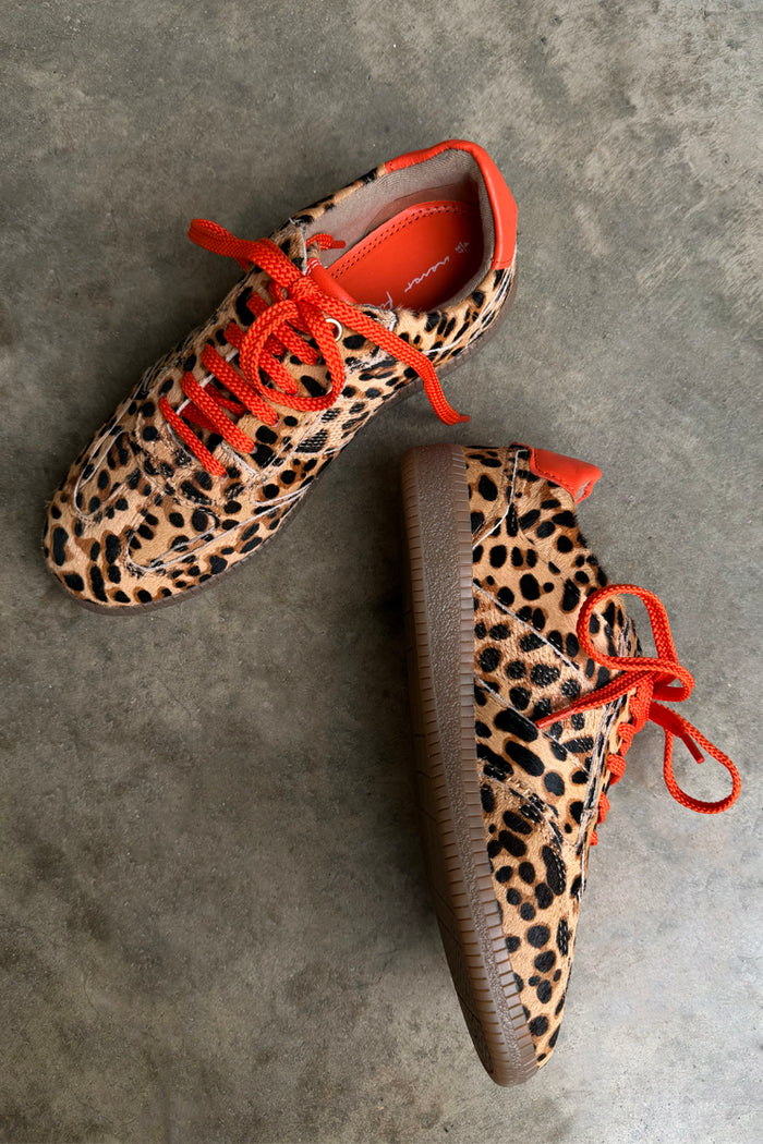 Leopard Pony Trainers featuring contrast orange laces and a gum sole in an iconic leopard print.