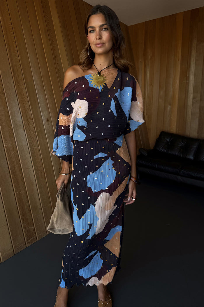 Mara Abstract Tilly Dress in plisse fabric with a brown abstract print, gold metallic flecks and a voluminous top.