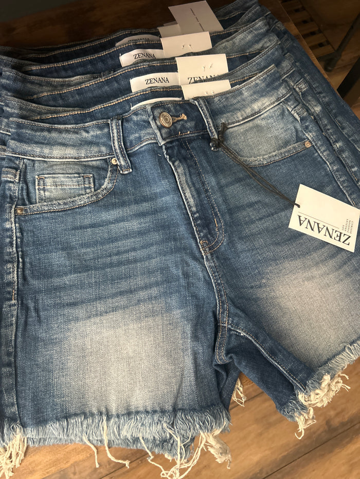Mid rise frayed denim shorts