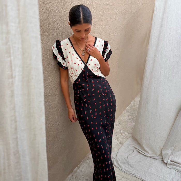 Mono Rose Betsy Midi Dress with red rose print, contrast panels, frill sleeves and a tie-detail V-neckline.