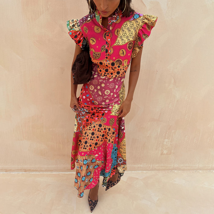 Morocco Remi Dress in a multi-coloured patchwork print featuring pleated frill sleeves and an asymmetrical skirt.