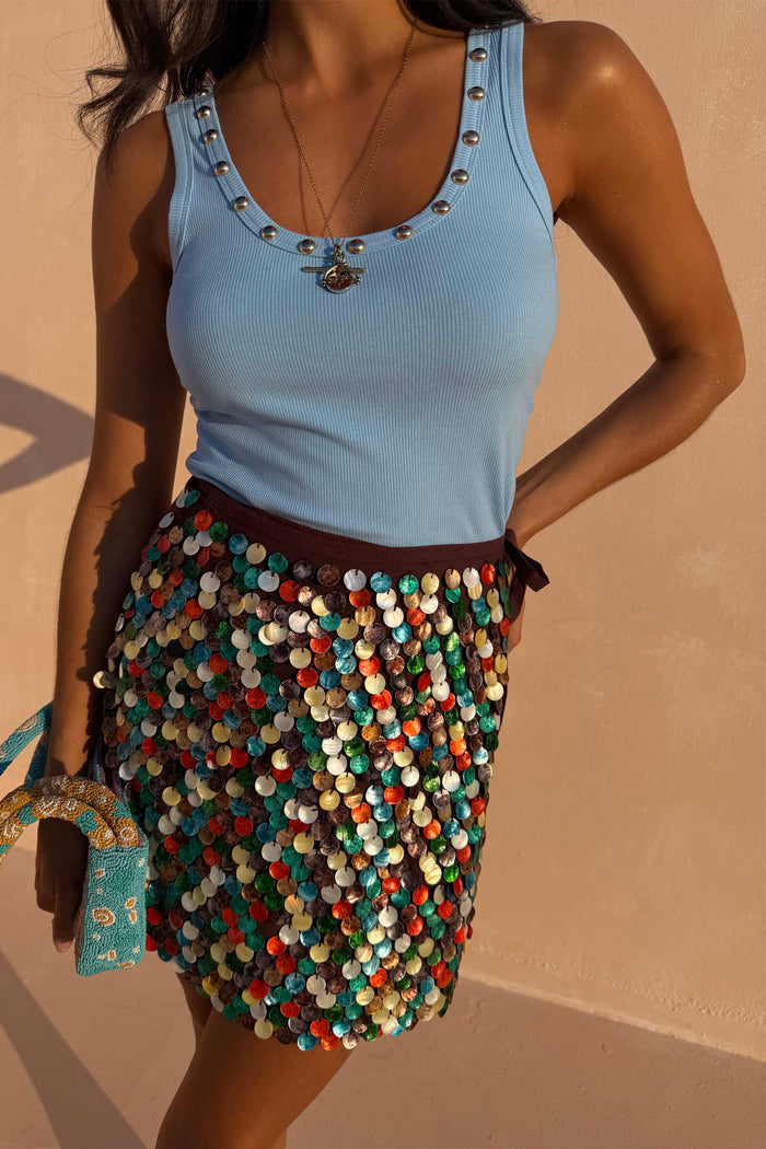 Multi Shell Mini Wrap Skirt with multicoloured pearlescent beads and a multi-wear wrap tie for vacation styling.