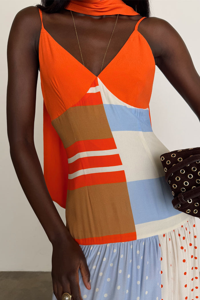 Multi Stripe Bea Dress in orange and blue with a pleated polka dot skirt and matching scarf detail.