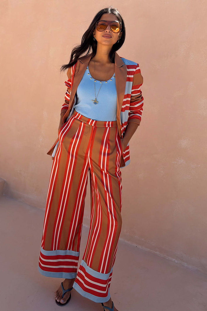 Multi Stripe Marnie Trousers in a red and blue wide-leg silhouette, styled as a co-ord for feel good dressing.