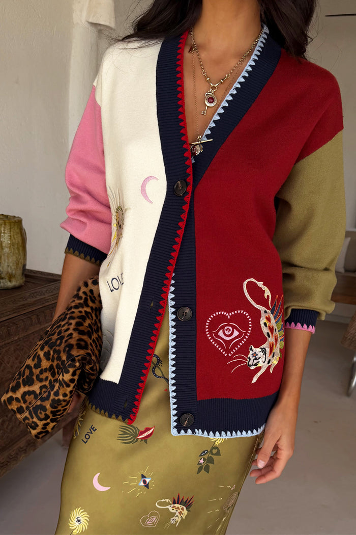 Mystical Martha Cardigan with multicoloured colour-blocking, embroidered motifs and contrast blanket stitching.