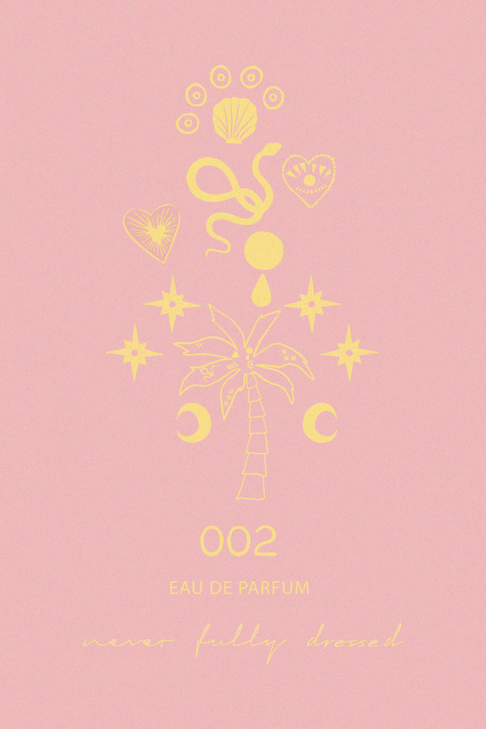 NFD Eau De Parfum 002 graphic featuring yellow palm tree, moon, and star icons on a blush pink background.