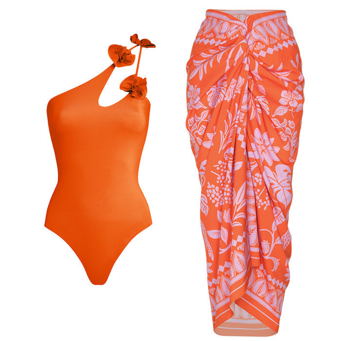 one-shoulder floral one-piece with printed sarong – TROPIC