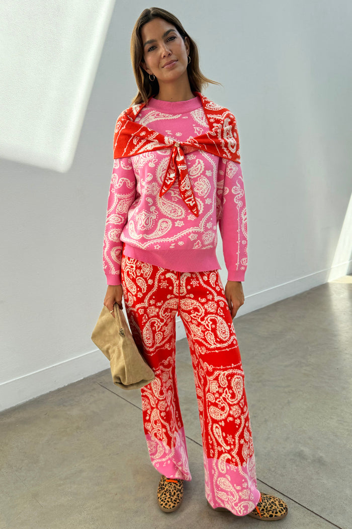 Pink and red bandana print Copenhagen Jumper with a matching necktie, styled as a co-ord set in a soft knit.