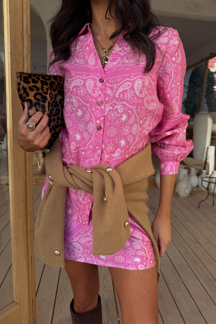 Pink Bandana Mini Dorris Skirt and matching shirt in a paisley print styled with a tan cardigan and leopard clutch.