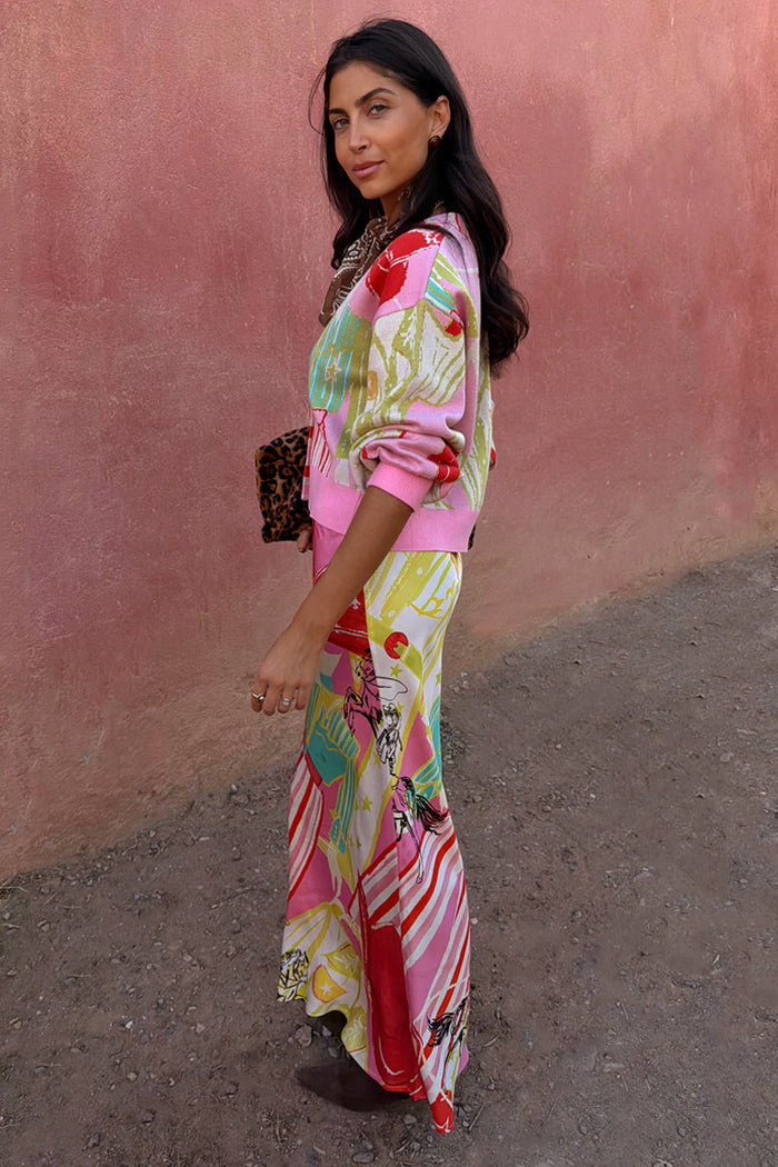 Pink Dallas Dorris Skirt featuring an in-house abstract cowboy print, styled with a matching cardigan.