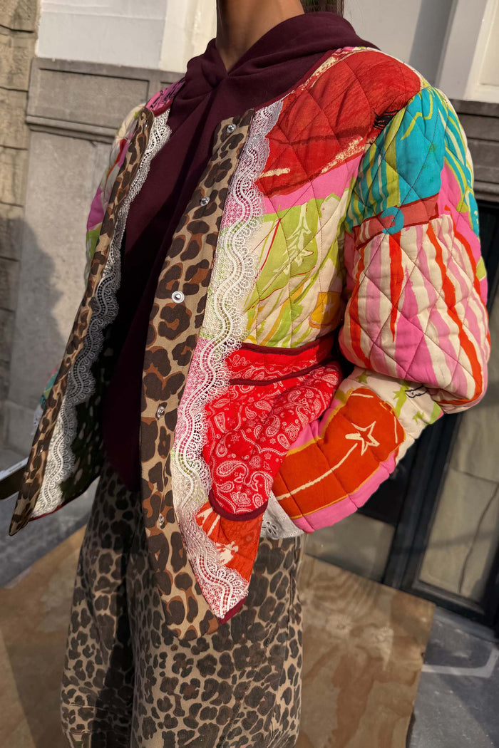 Pink Dallas Reversible Jacket in a quilted fabric with leopard print trim and white lace detailing.