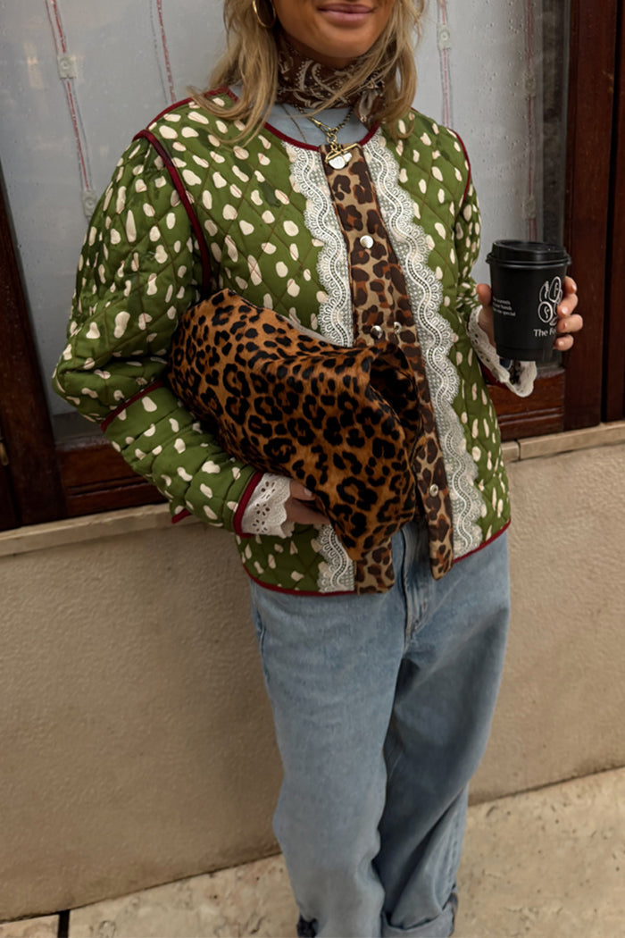Reversible quilted jacket in green deer print with leopard accents and white lace trim, styled with denim.