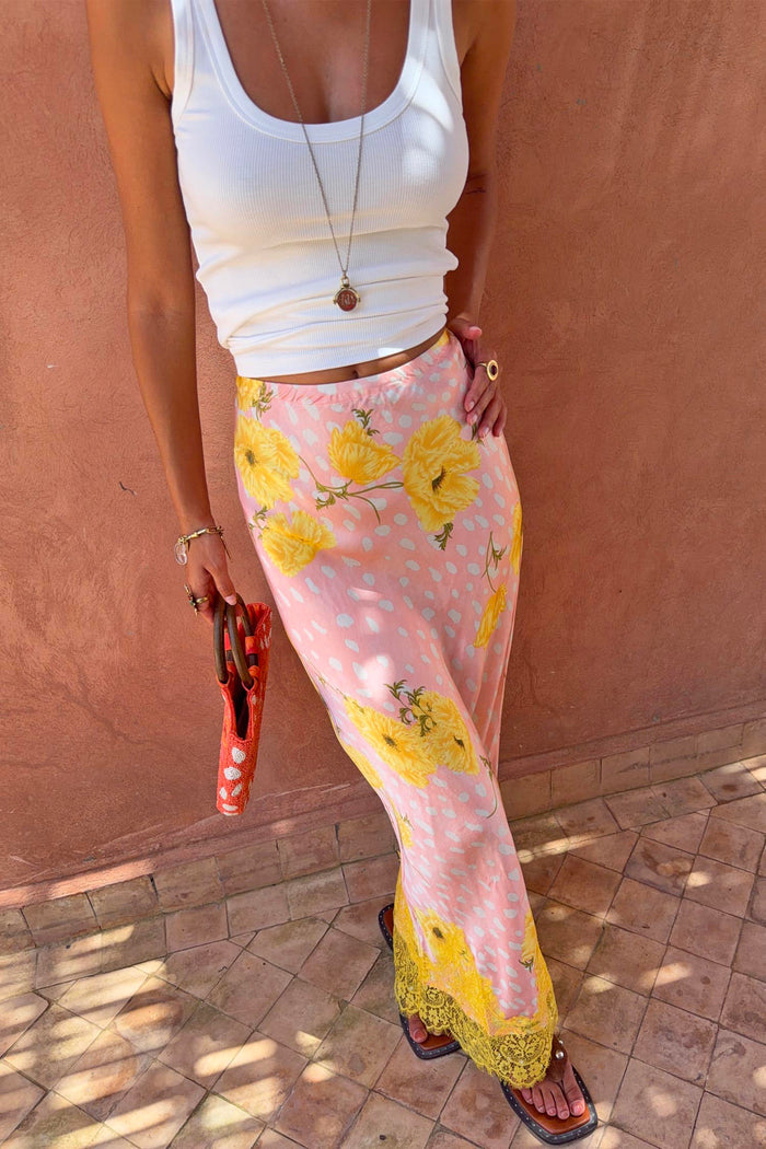 Pink Fawn Poppy Maeva Midi Skirt featuring a yellow floral and deer print with a contrast yellow lace trim.