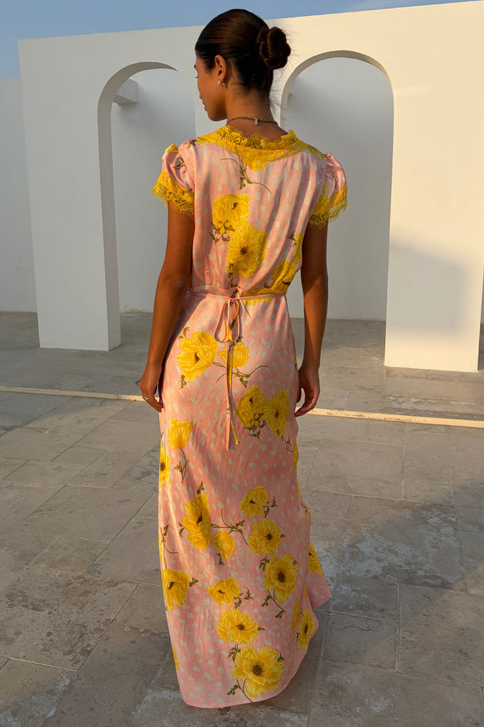 Pink Fawn Poppy Olivia Dress with yellow lace trim and tie-back waist, featuring iconic poppy motifs and deer print.