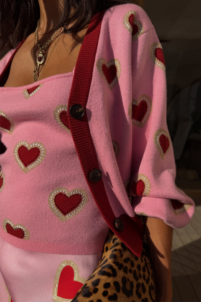Pink Hearts Knit Tank and cardigan co-ord featuring red heart prints, designed in-house on a pink knit.