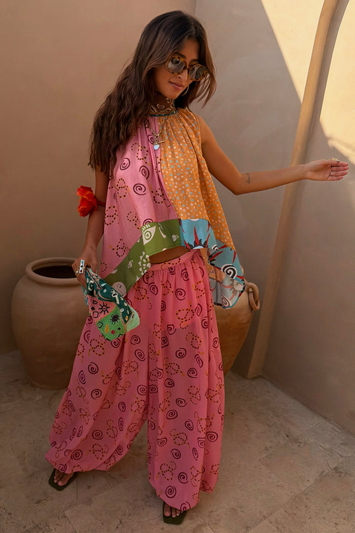 Pink Snake Balloon Trouser featuring snake and swirl motifs in a balloon silhouette for feel good dressing.