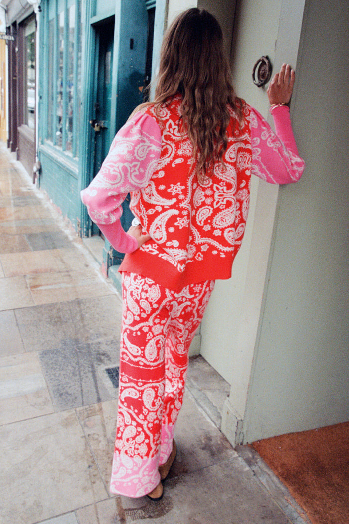 Red Bandana Martha Cardigan and matching joggers in a red and pink bandana print for a London look.
