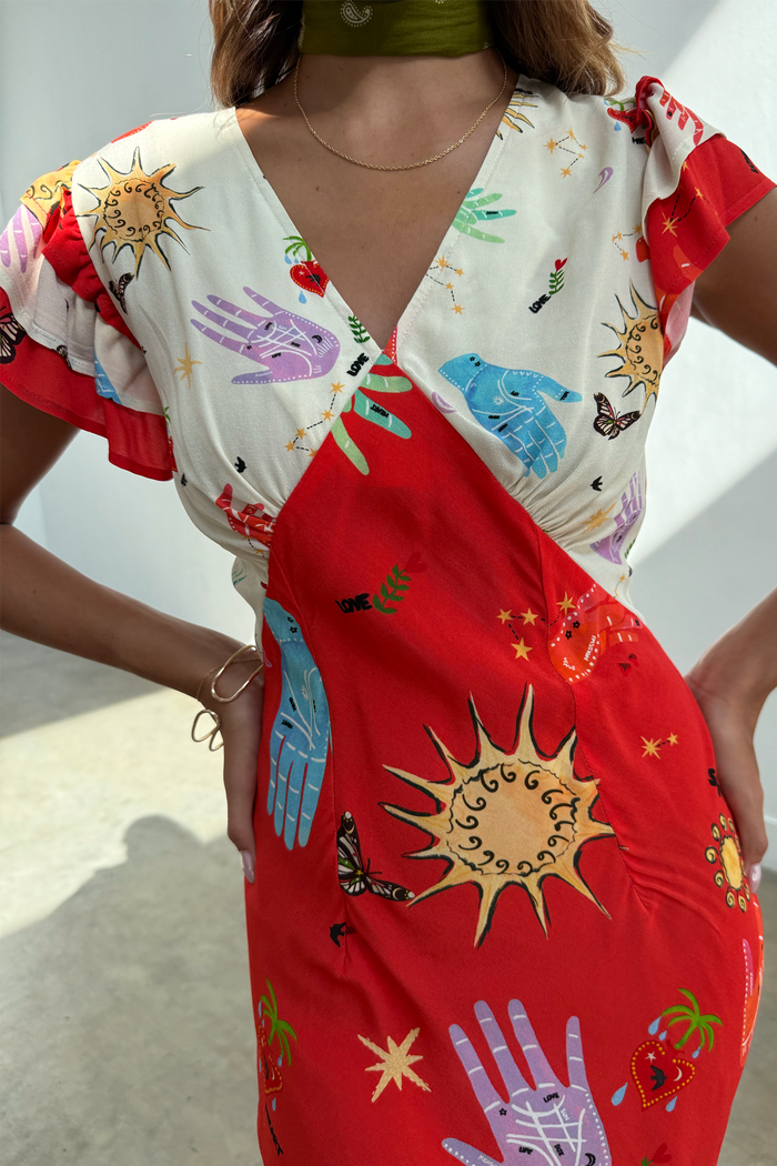 Red Celestial Midi Dress featuring a V-neckline and flutter sleeves with iconic celestial sun and hand motifs on viscose.