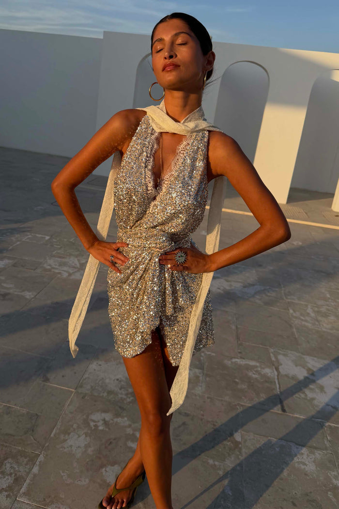 Silver Sequin Lily Top with cream lace ties and multi-wear wrap styling, paired as a partywear co-ord.