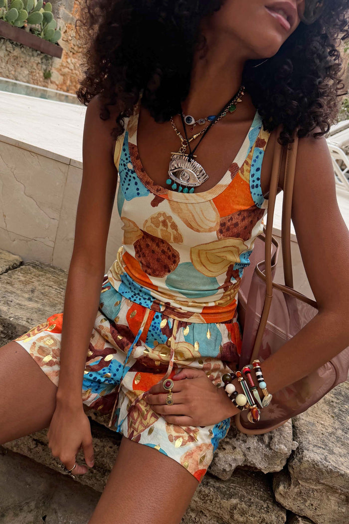 Shell Rib Tank featuring an ocean-toned abstract shell print and ribbed texture, styled for feel good vacation dressing.