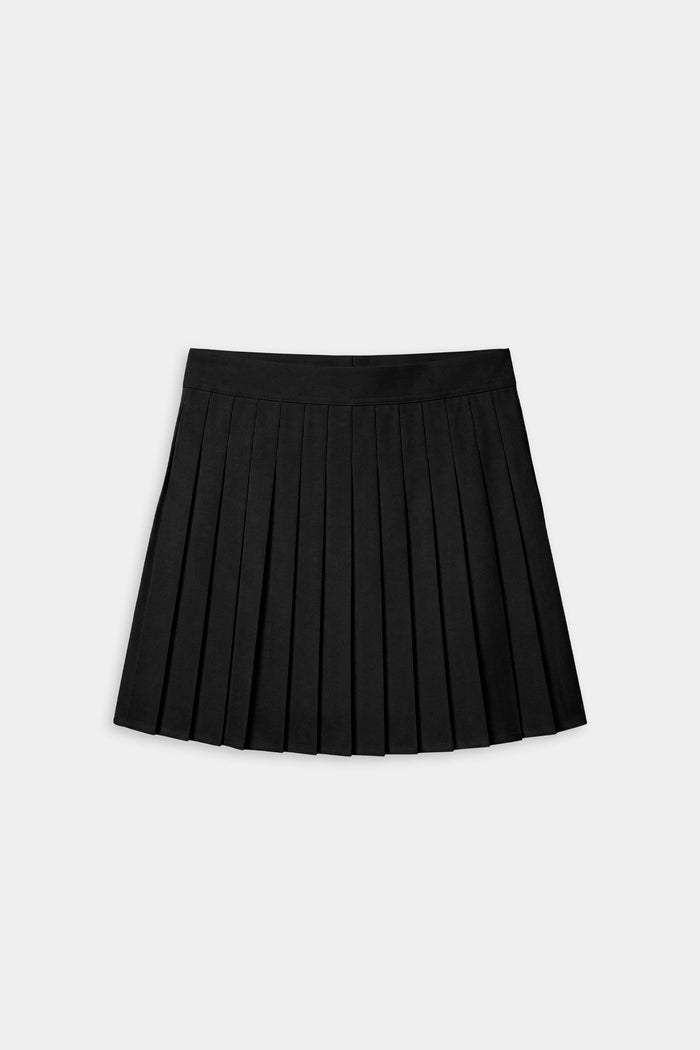The SPLITS59 Shira Woven Pleated Skort in black is shown against a plain light gray background, ideal for court sports or gym workouts.