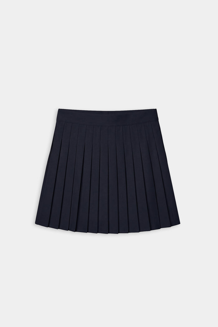 The SPLITS59 Shira Woven Pleated Skort in Indigo, ideal for court sports or gym workouts, is shown against a plain white background.