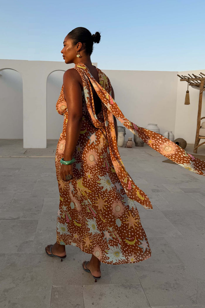Star Fawn Sophie midaxi dress in brown with sun motifs and a detachable scarf, shown on a curve model.