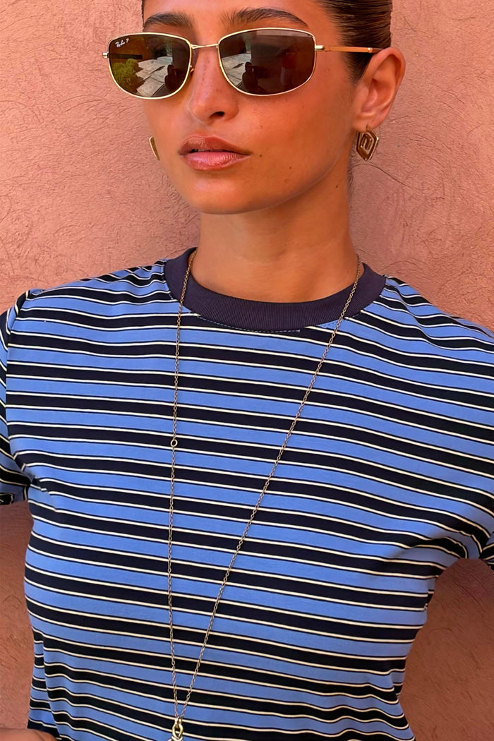 Stripe Bra Baby T-Shirt with blue and navy horizontal stripes, a contrasting crew neck and fitted silhouette.
