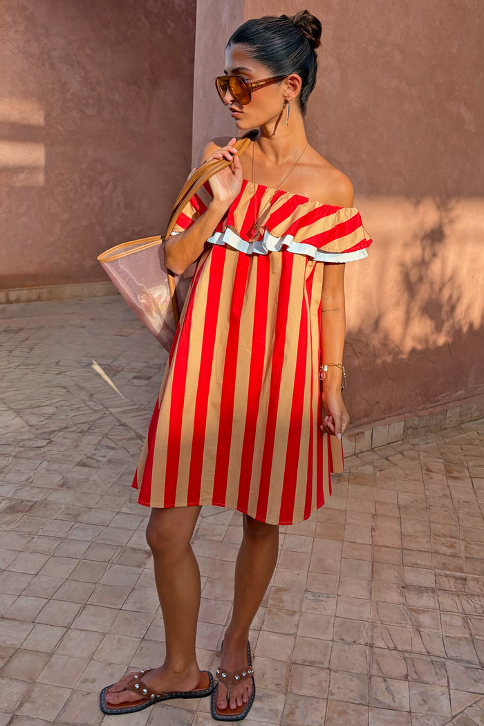 Tomato Stripe Mini Dress in red and camel stripes with a ruffled off-the-shoulder neckline.