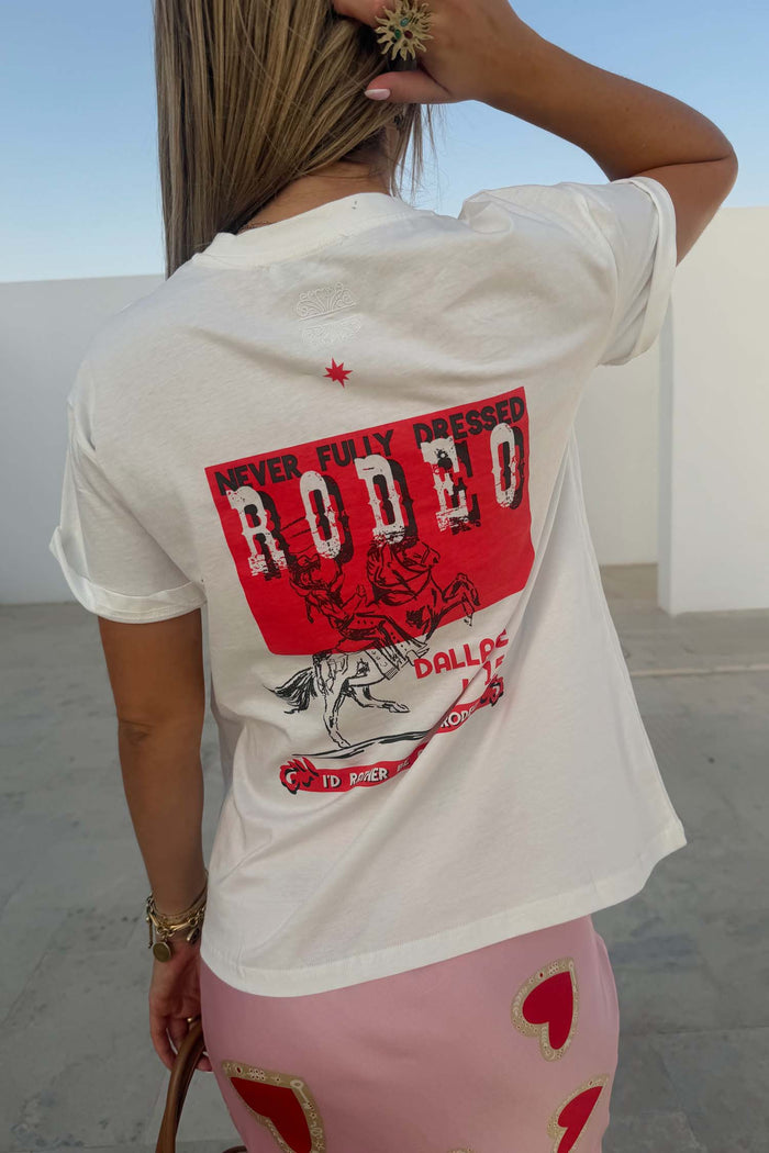 White cotton Rodeo T-Shirt featuring a bold red graphic on the back and a boxy fit.