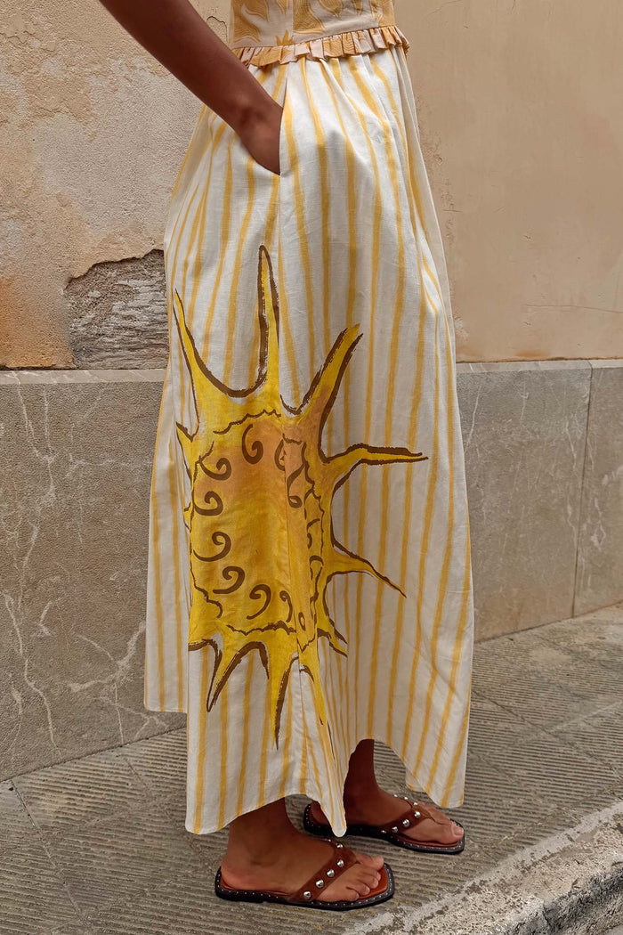 Yellow Stripe Ashley Dress in cotton-linen featuring a hand-painted sun motif and yellow stripes.